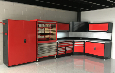Corner Workbench in Charcoal Grey with Kuboto Orange Doors and Stainless Steel Drawers.