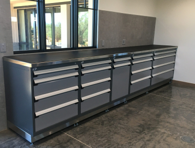 Rousseau Base Cabinets with Stainless Steel Tops and Rubber Mat.
