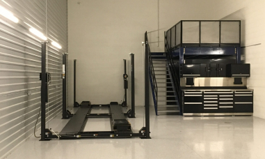 Double Unit with Front to Back Direct Lift ProPark 8PL lifts with 15' wide loft and GT workbench.
